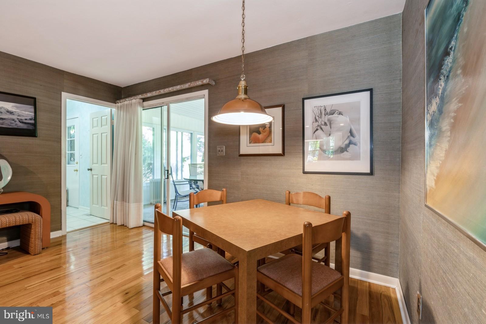 149 Parker Road South Plainsboro, NJ 08536 - Photo 14 of 57 a view of a dining room with furniture window and wooden floor