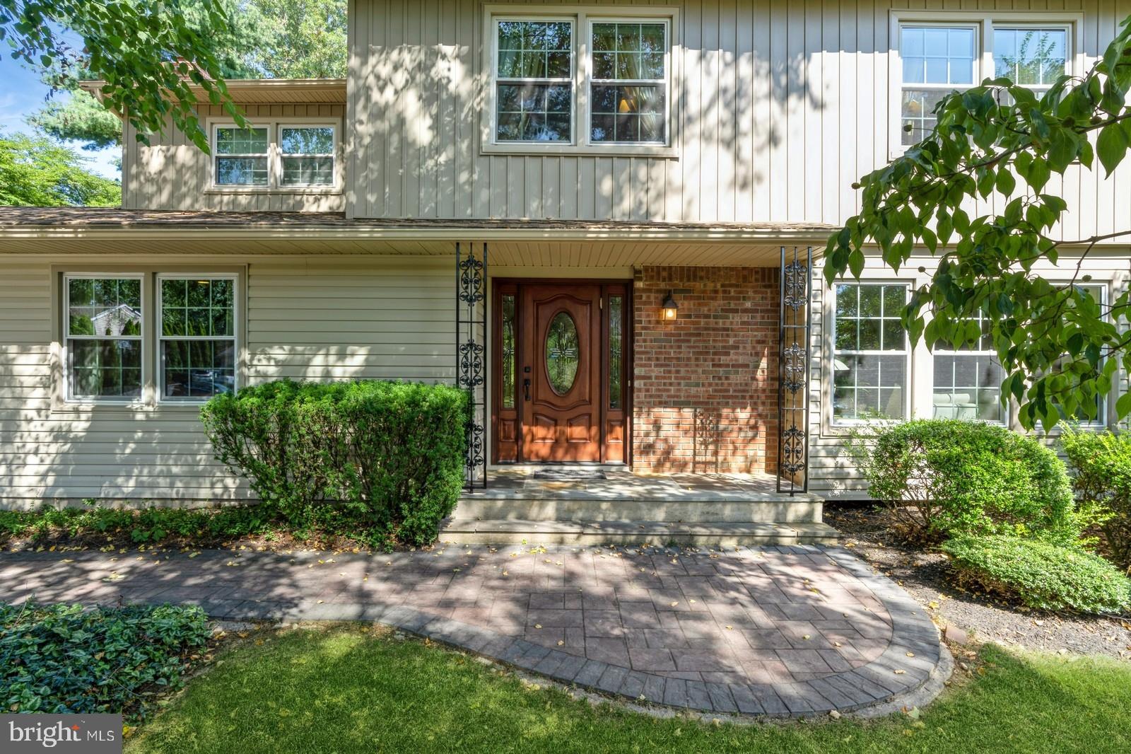 149 Parker Road South Plainsboro, NJ 08536 - Photo 2 of 57 a front view of a house with garden