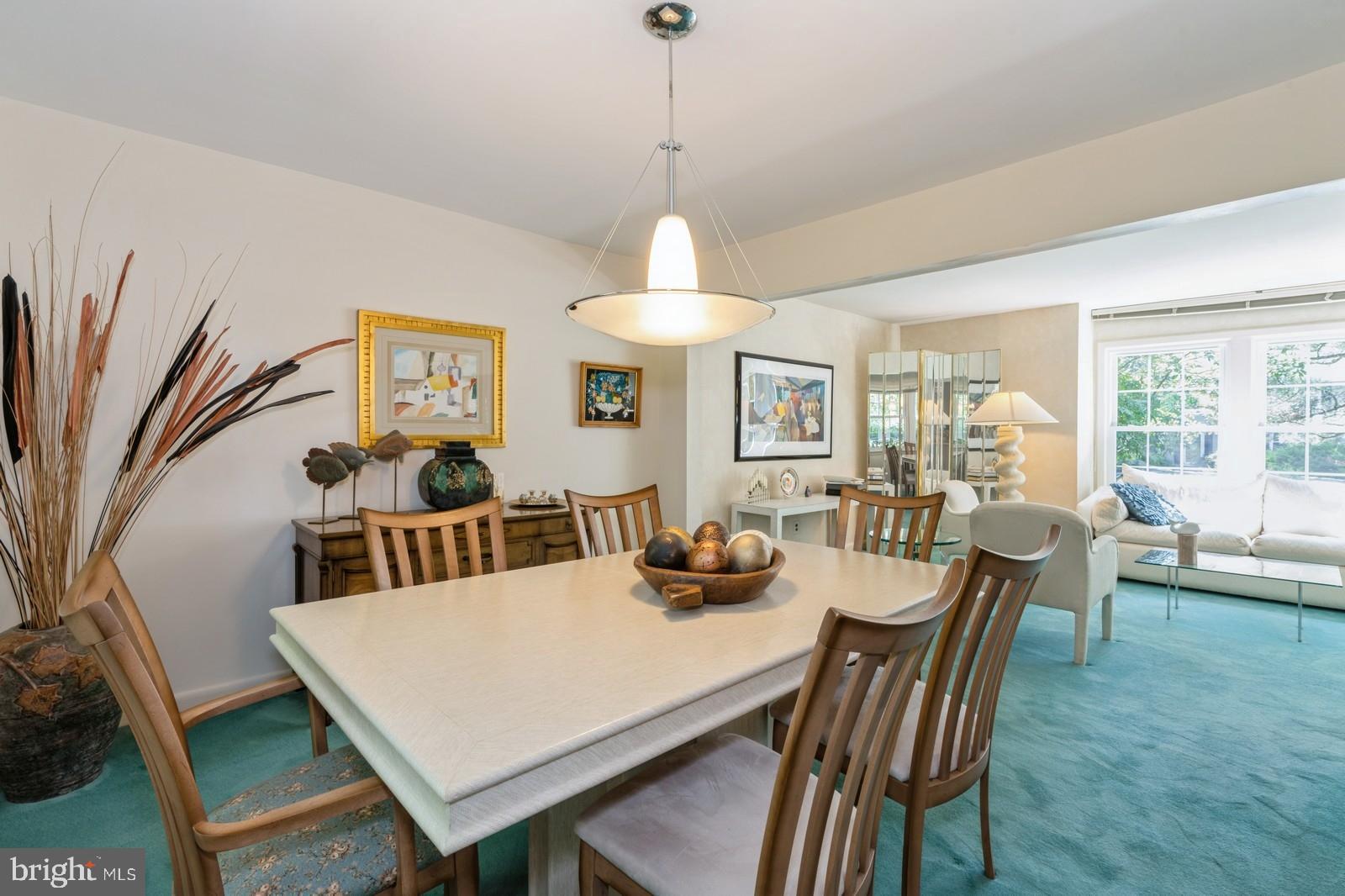 149 Parker Road South Plainsboro, NJ 08536 - Photo 23 of 57 a dining room with furniture a window and a chandelier