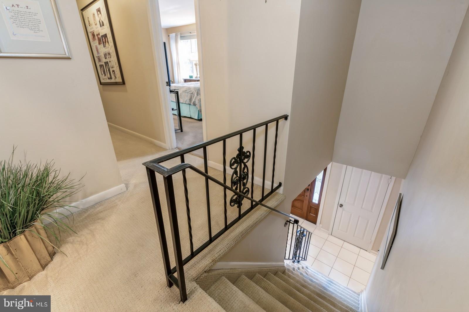 149 Parker Road South Plainsboro, NJ 08536 - Photo 34 of 57 a view of staircase with railing and white walls