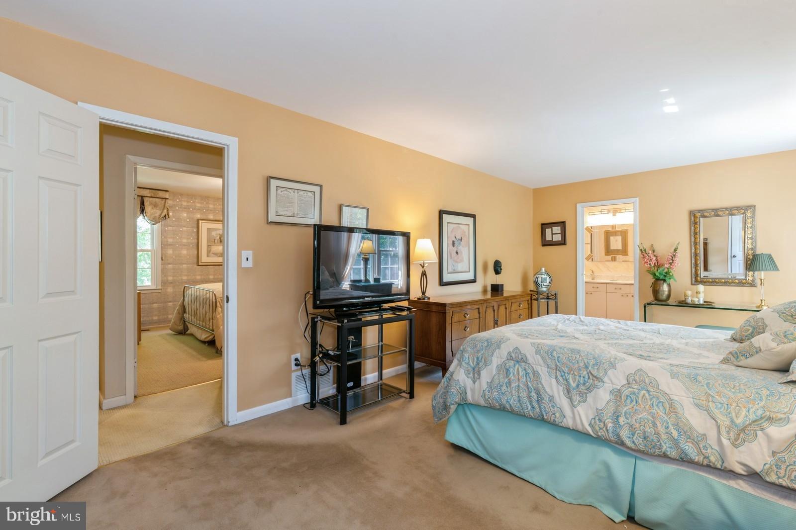 149 Parker Road South Plainsboro, NJ 08536 - Photo 38 of 57 a bedroom with a bed and a flat screen tv