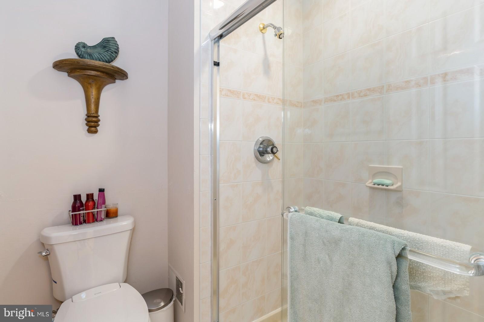 149 Parker Road South Plainsboro, NJ 08536 - Photo 40 of 57 a white toilet sitting next to a bathroom sink