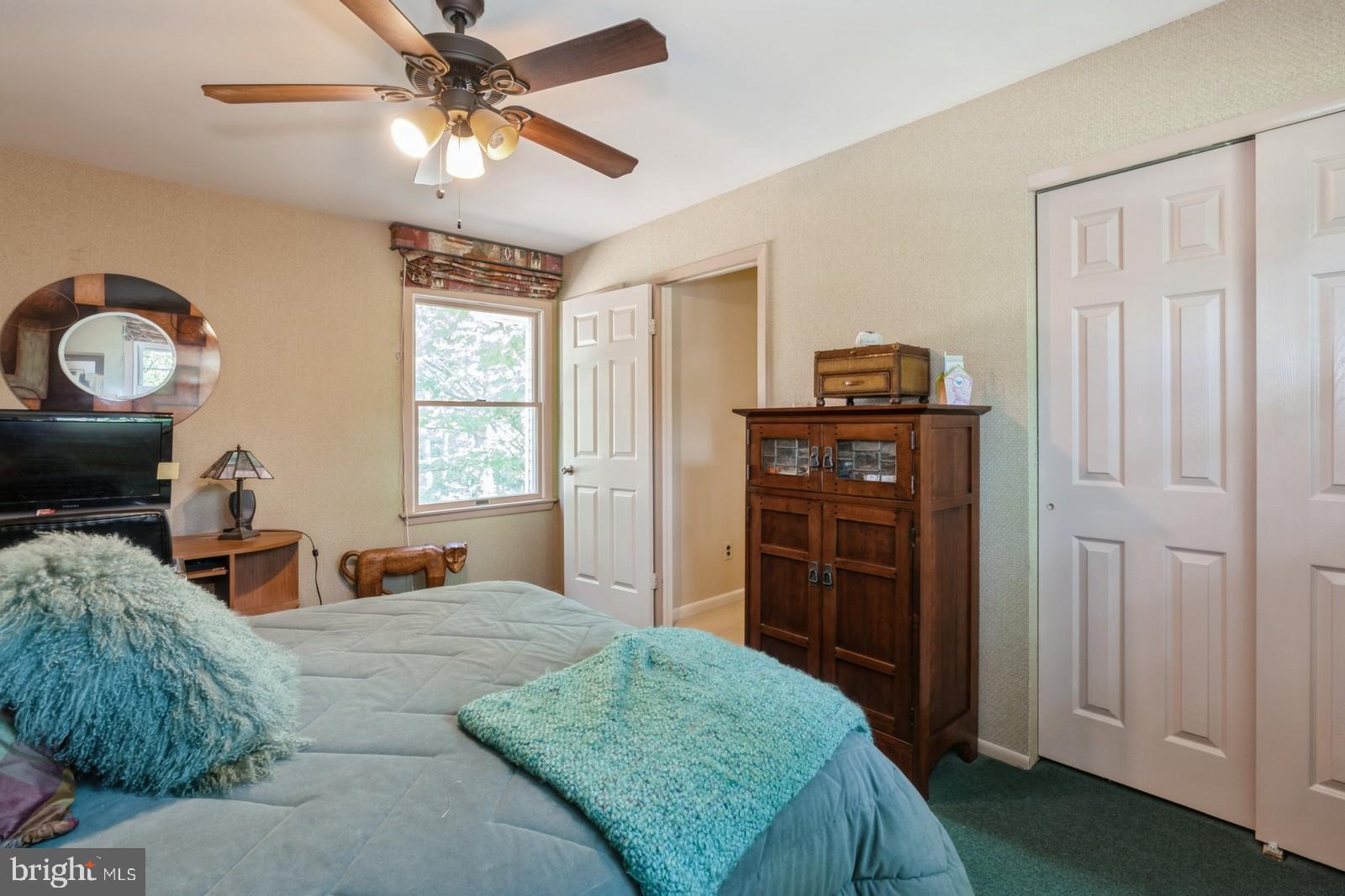 149 Parker Road South Plainsboro, NJ 08536 - Photo 44 of 57 a bed room with a bed and a television