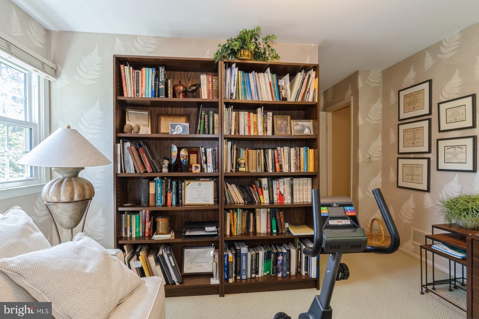 149 Parker Road South Plainsboro, NJ 08536 - Photo 47 of 57 a living room with furniture and a book shelf