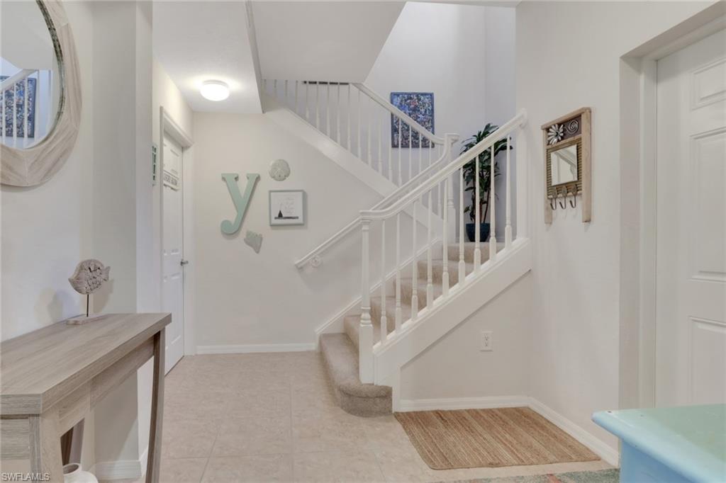 4500 Botanical Pl Circle, Unit 101 Naples, FL 34112 - Photo 6 of 44 a view of entryway and hall