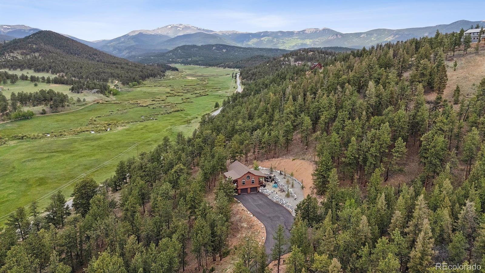 2894 County Road 43 Bailey, CO 80421 - Photo 5 of 40 a view of a town with mountains in the background