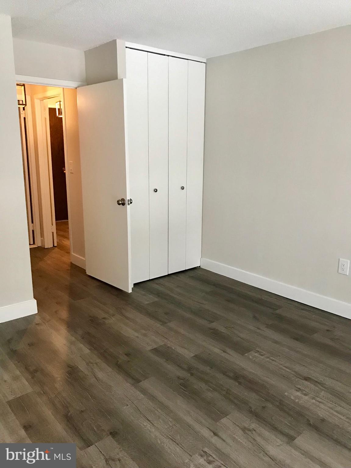 2020 Walnut Street, Unit 10J Philadelphia, PA 19103 - Photo 7 of 18 a view of a room with wooden floor