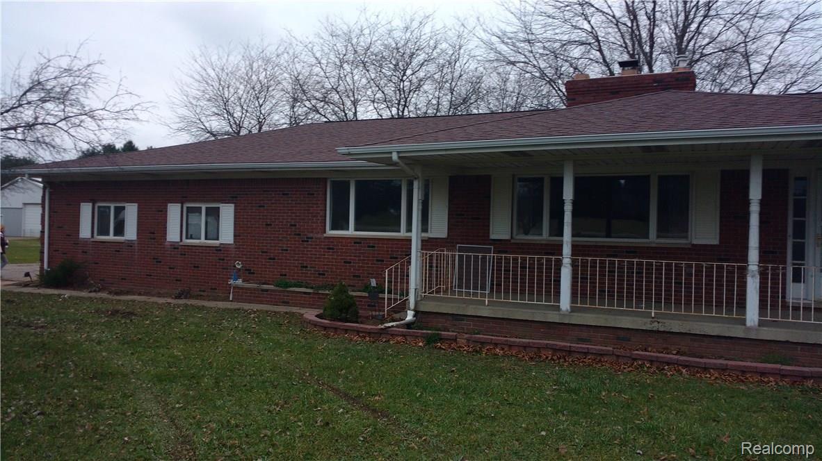 10191 Elms Road Montrose, MI 48457 - Photo 2 of 37 Front door and covered porch 2