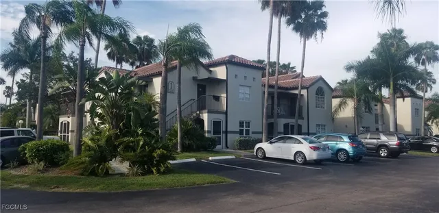 a cars parked in front of a house