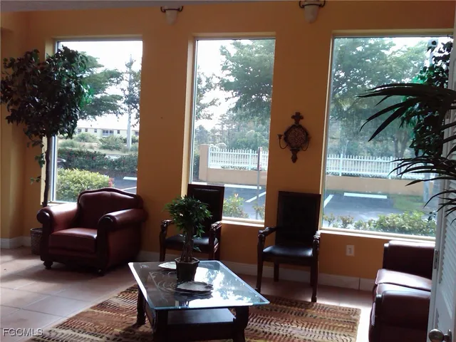 a outdoor living space with patio furniture and a potted plant