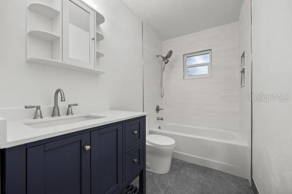 6002 Northwest 33 Street Gainesville, FL 32653 - Photo 24 of 29 a bathroom with a sink toilet a bathtub and shower