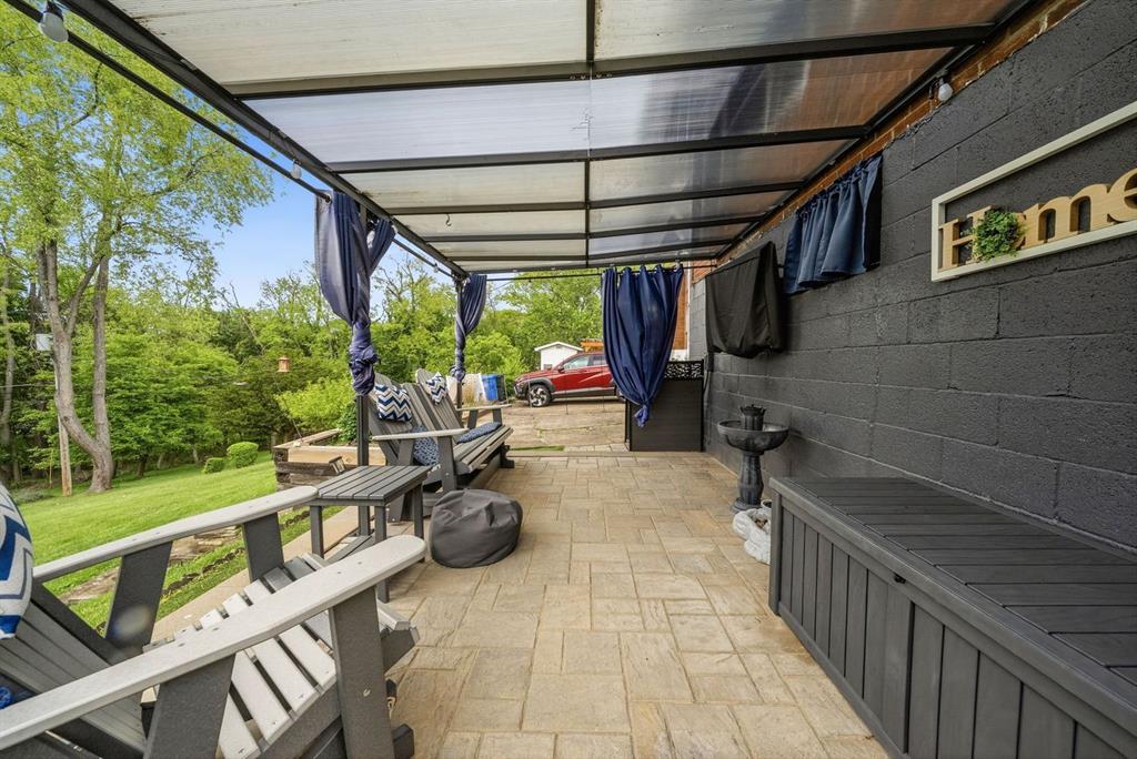 4768 Rolling Hills Road Pittsburgh, PA 15236 - Photo 35 of 46 a view of a porch with furniture and garden