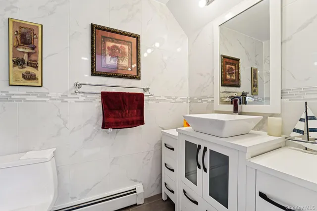 a kitchen with a sink and a stove top oven