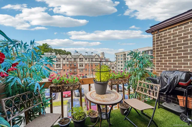 a view of a chairs and table in patio