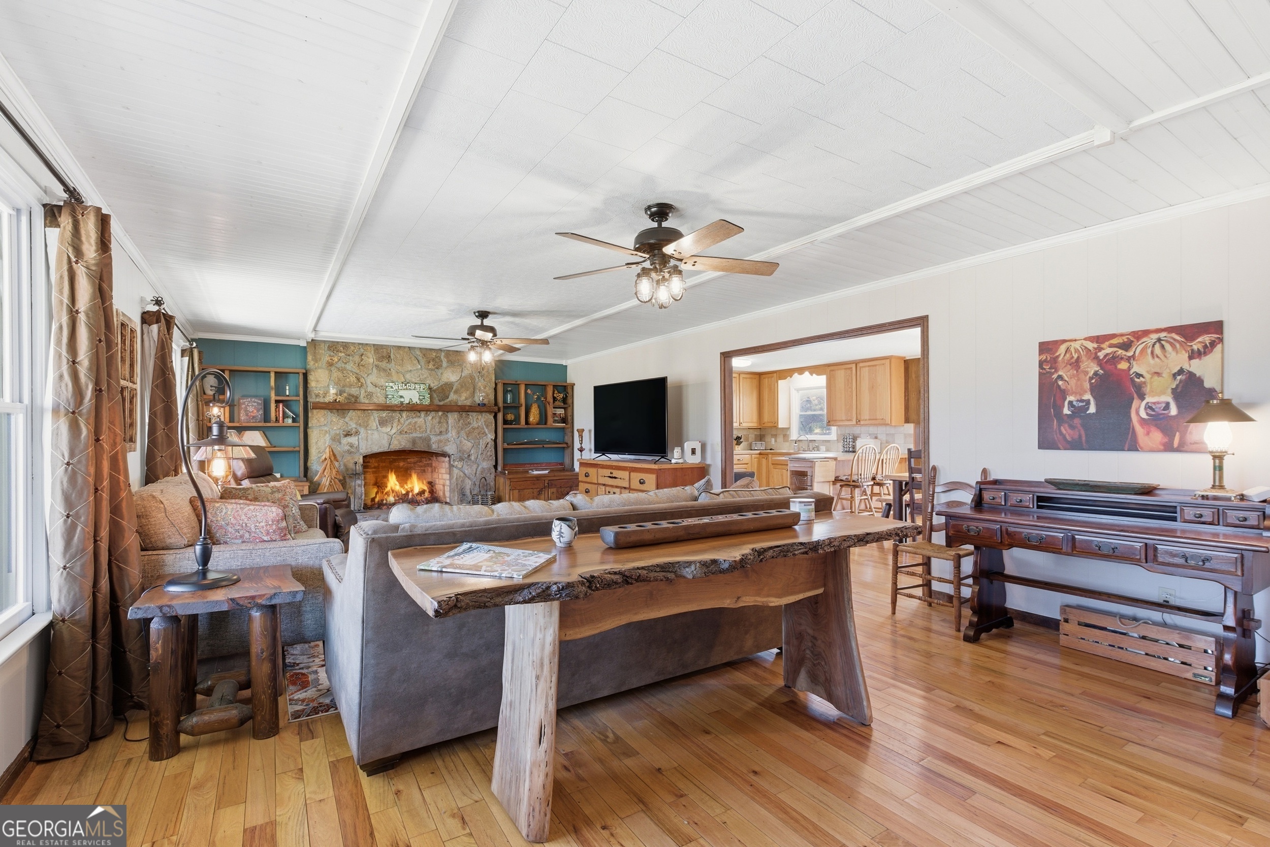 190 Legendary Lane Rabun Gap, GA 30568 - Photo 16 of 47 a living room with furniture fireplace and flat screen tv