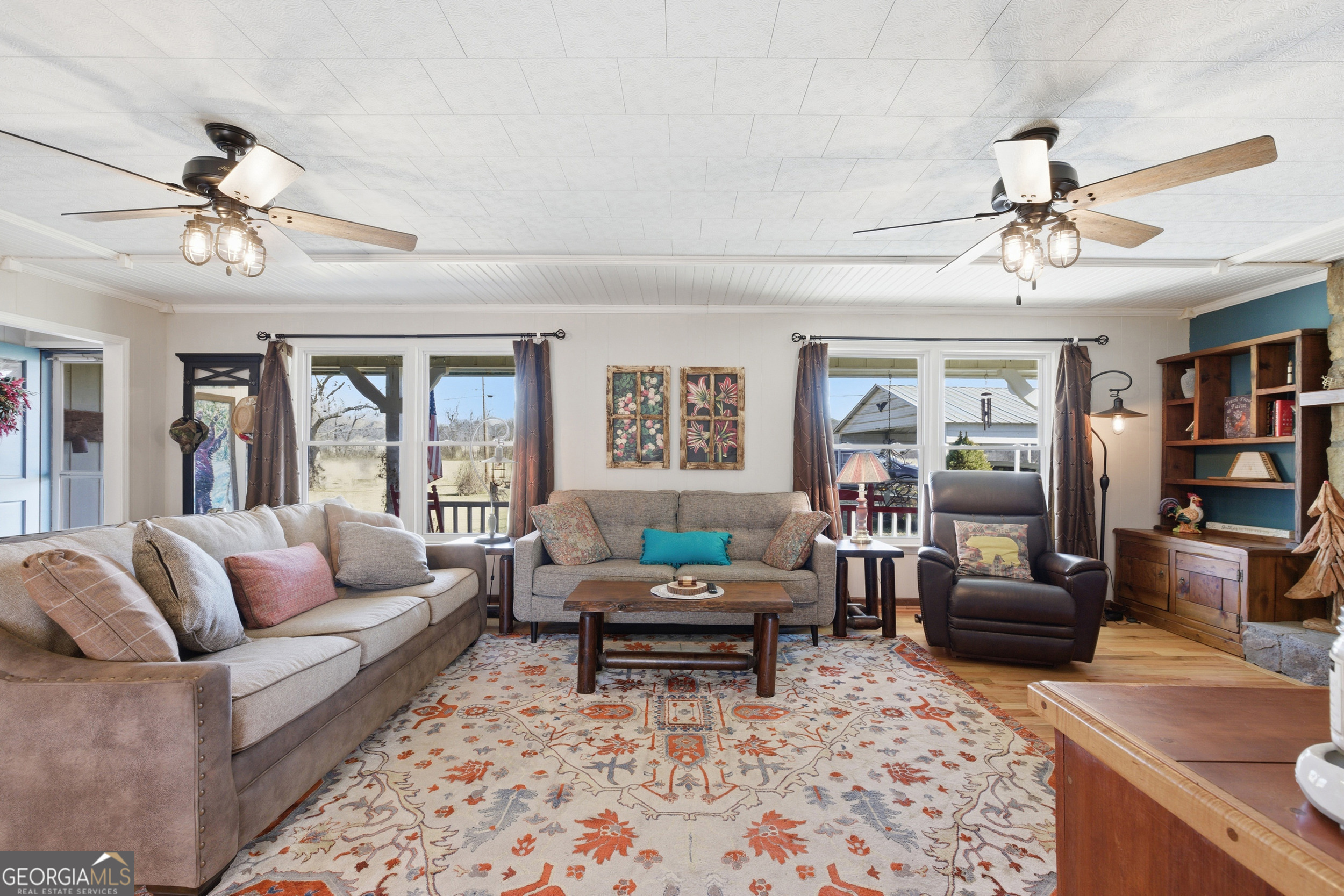 190 Legendary Lane Rabun Gap, GA 30568 - Photo 19 of 47 a living room with furniture and a large window
