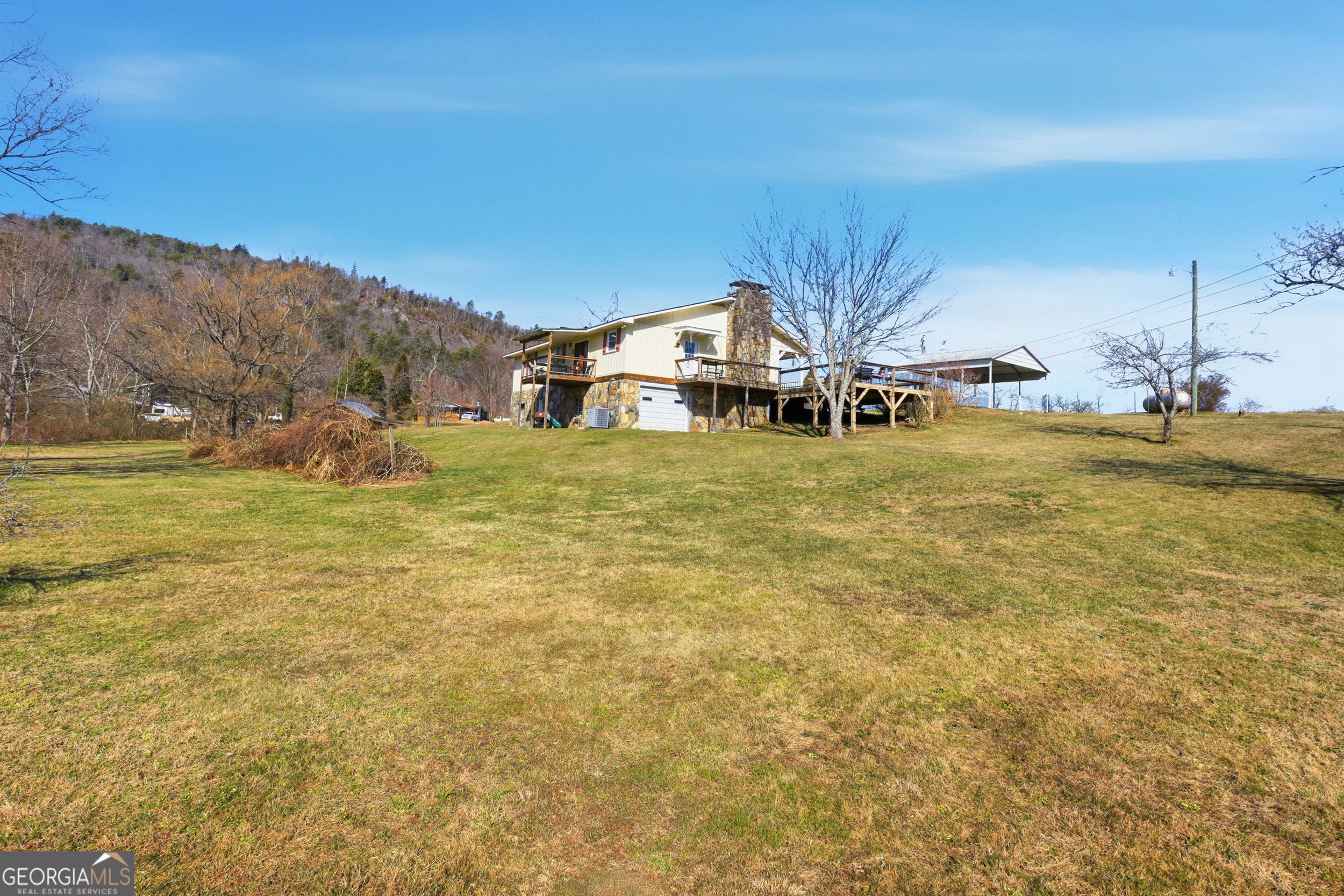 190 Legendary Lane Rabun Gap, GA 30568 - Photo 45 of 47 a front view of a house with a yard