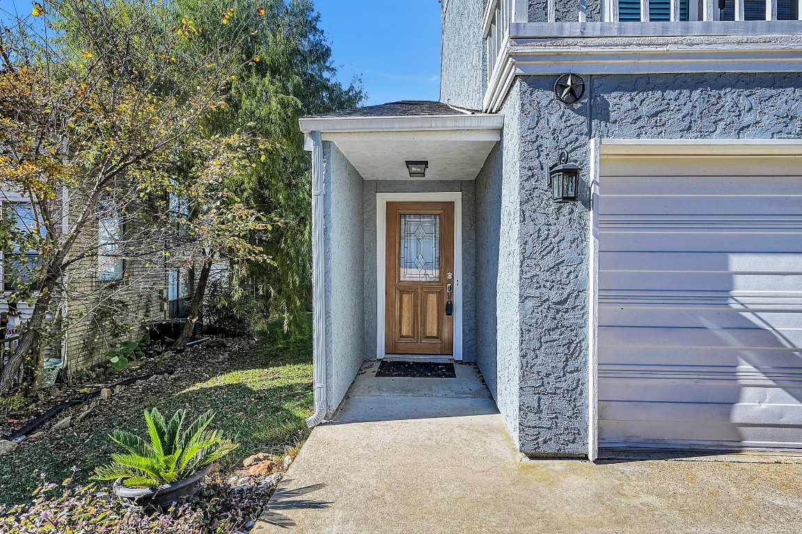 125 Capetown Street Conroe, TX 77356 - Photo 2 of 23 a front view of a house with a garden