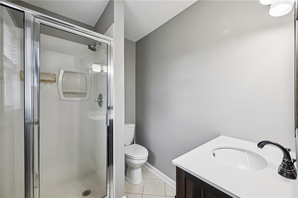 2825 Northeast Expressway, Unit O2 Atlanta, GA 30345 - Photo 22 of 27 a bathroom with a sink and mirror