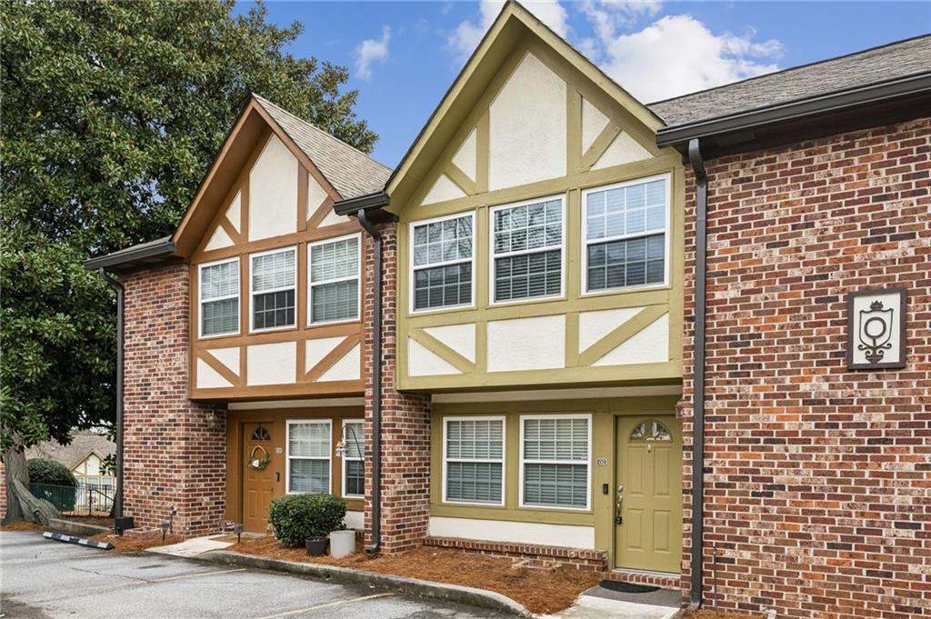 2825 Northeast Expressway, Unit O2 Atlanta, GA 30345 - Photo 3 of 27 a view of outdoor space yard and front view of a house