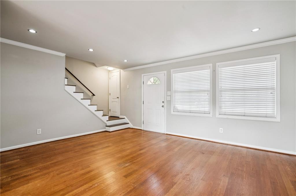 2825 Northeast Expressway, Unit O2 Atlanta, GA 30345 - Photo 8 of 27 wooden floor in an empty room with a window