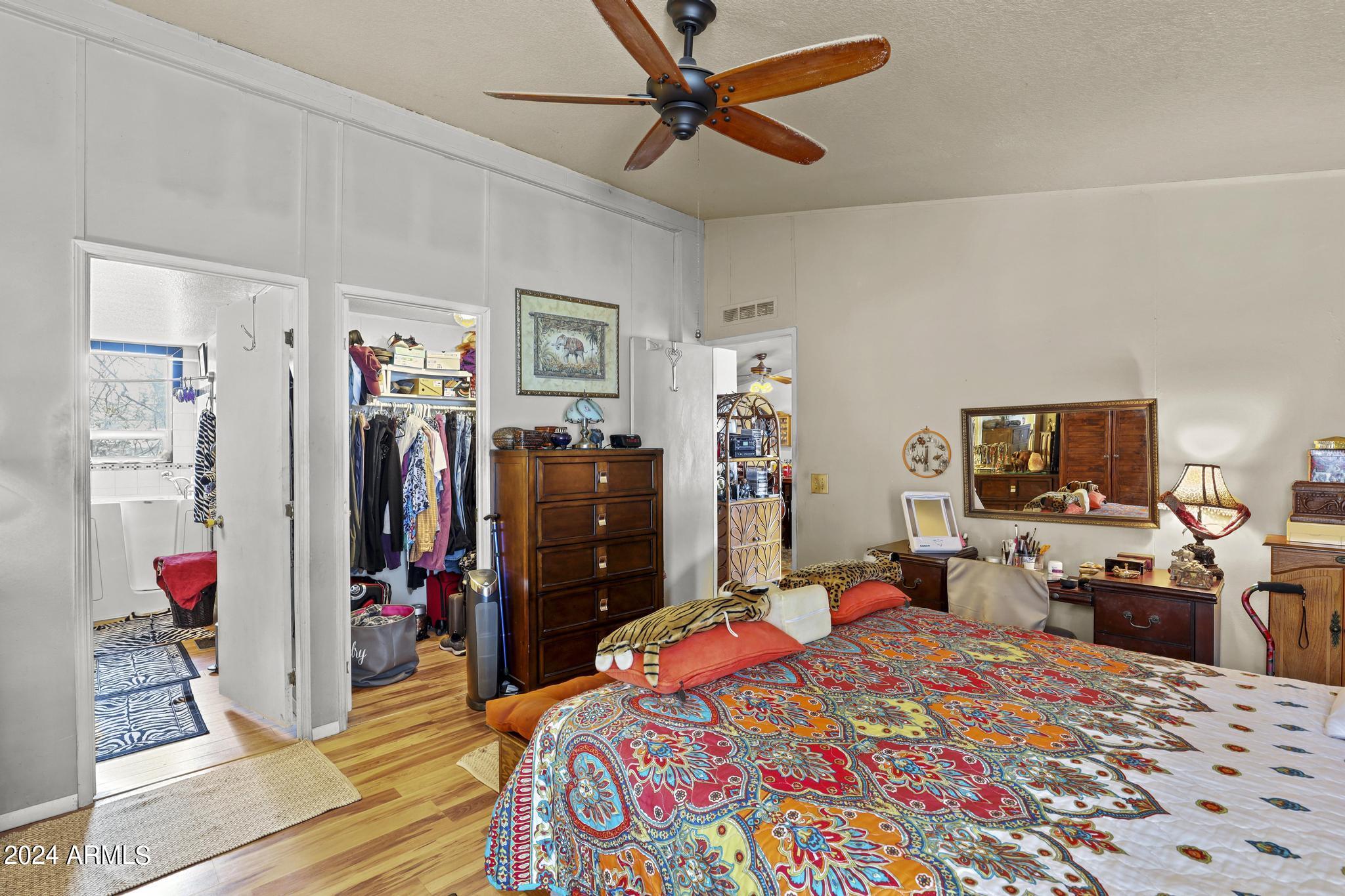 308 East Cherry Street Payson, AZ 85541 - Photo 11 of 22 a bed room with a bed and a flat screen tv
