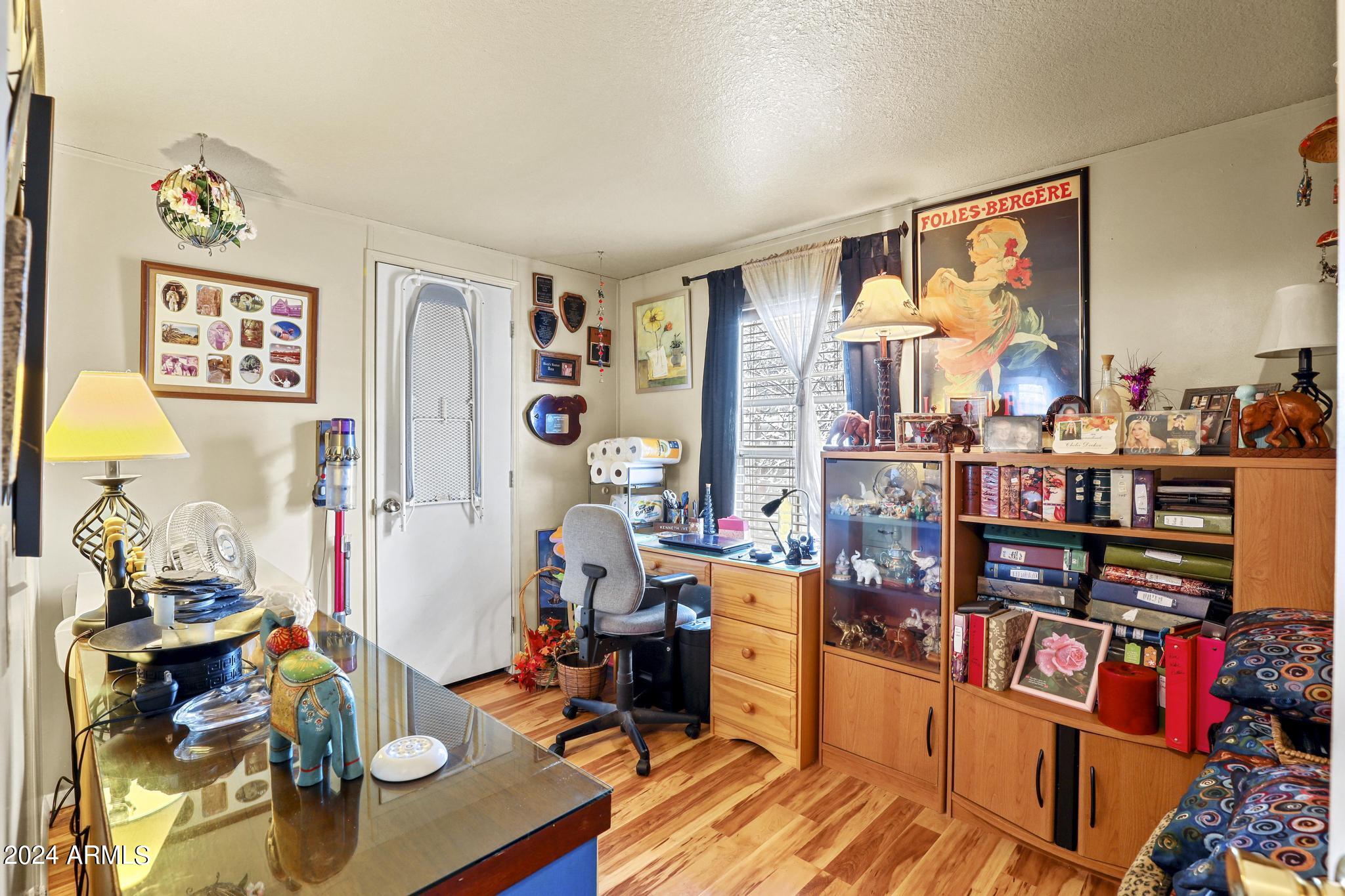 308 East Cherry Street Payson, AZ 85541 - Photo 15 of 22 a room with furniture and a flat screen tv