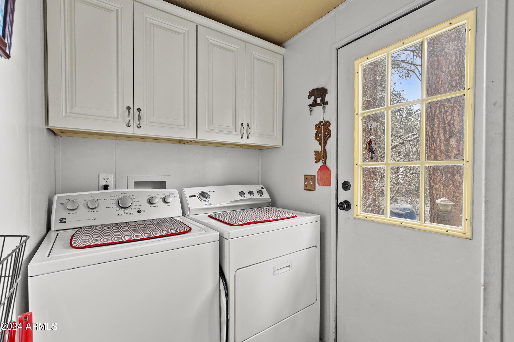 308 East Cherry Street Payson, AZ 85541 - Photo 17 of 22 a utility room with dryer and washer