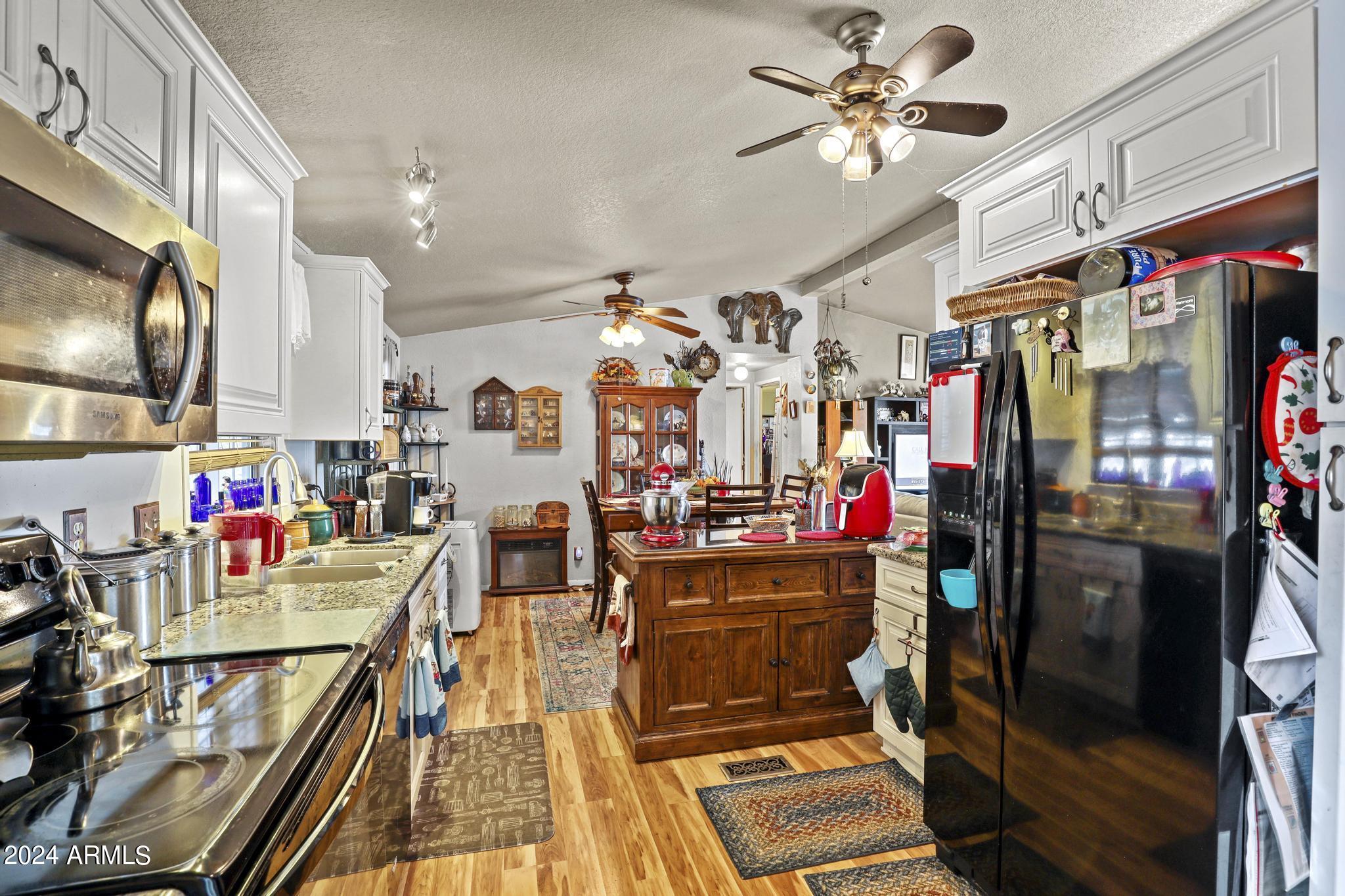 308 East Cherry Street Payson, AZ 85541 - Photo 8 of 22 a view of a entryway with furniture and chandelier
