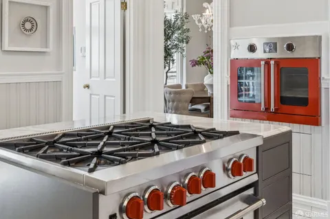 a view of sitting area with furniture and wooden floor
