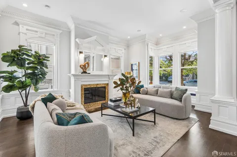 a bathroom with a toilet and a mirror