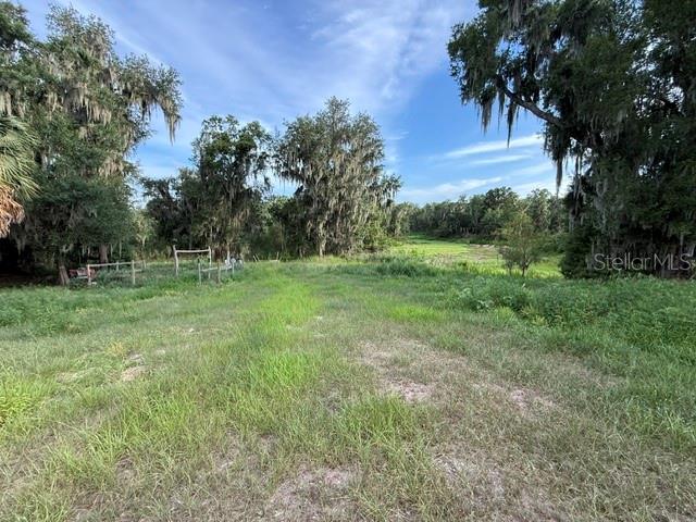 Pool Branch Road Fort Meade, FL 33841 - Photo 6 of 15 a view of outdoor space with deck and yard