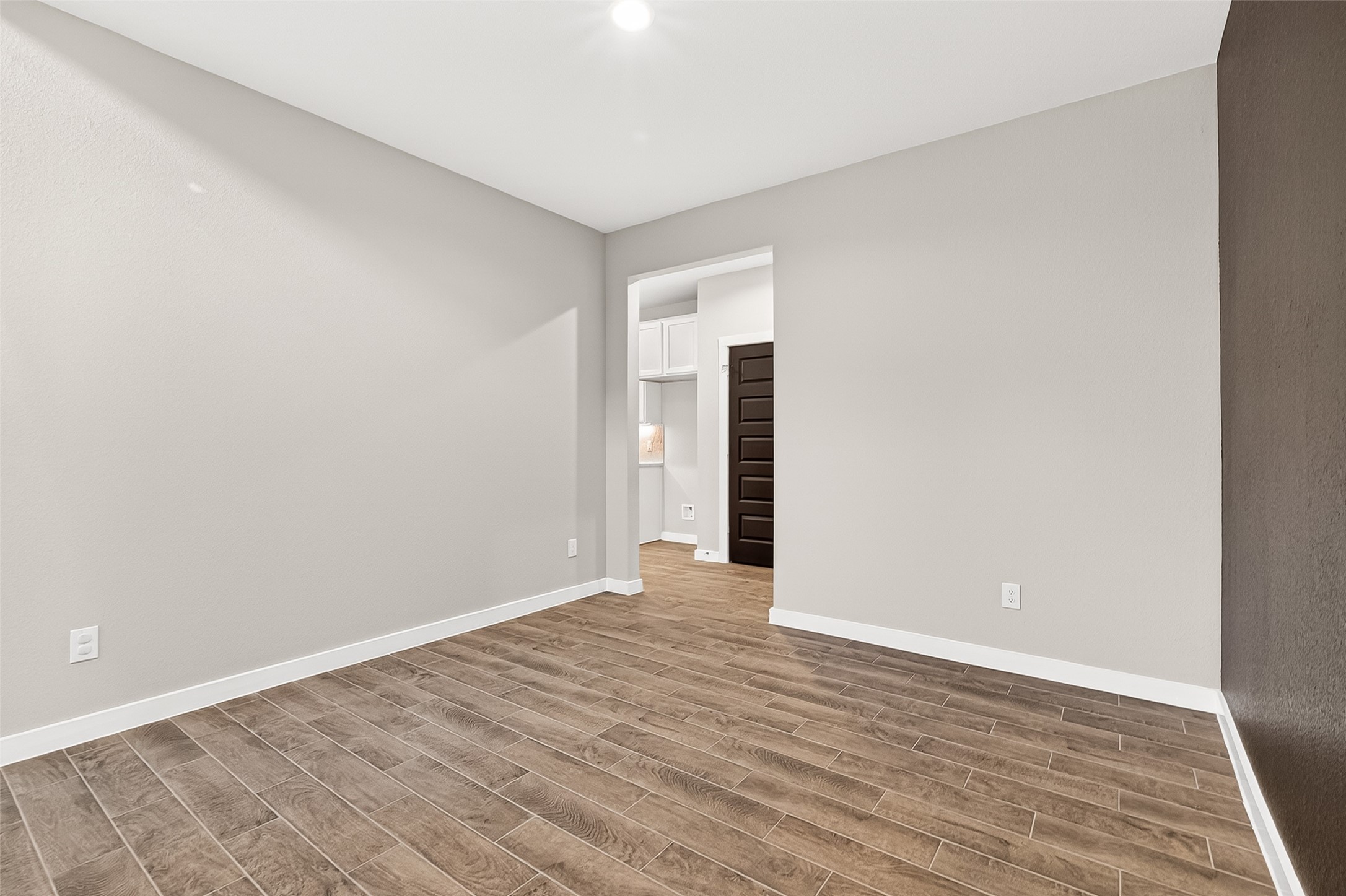 2142 Reed Cave Lane Spring, TX 77386 - Photo 9 of 50 a view of an empty room with wooden floor
