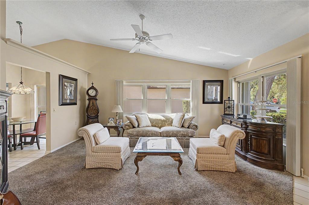 2662 Appleleaf Court Spring Hill, FL 34606 - Photo 5 of 47 a living room with furniture and a large window