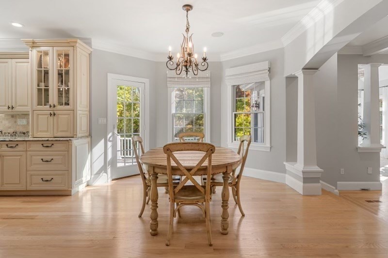 85 Colts Crossing Canton, MA 02021 - Photo 16 of 38 a view of a dining room with furniture window and wooden floor