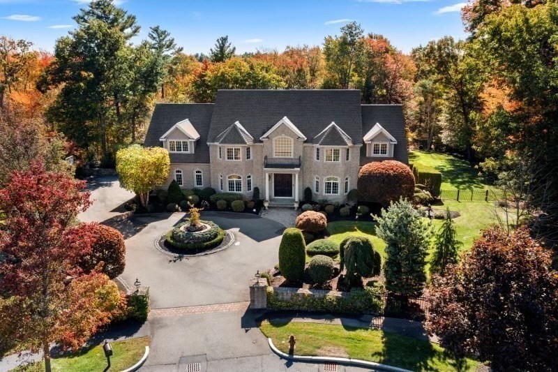 85 Colts Crossing Canton, MA 02021 - Photo 17 of 38 a front view of house with yard outdoor seating and green space