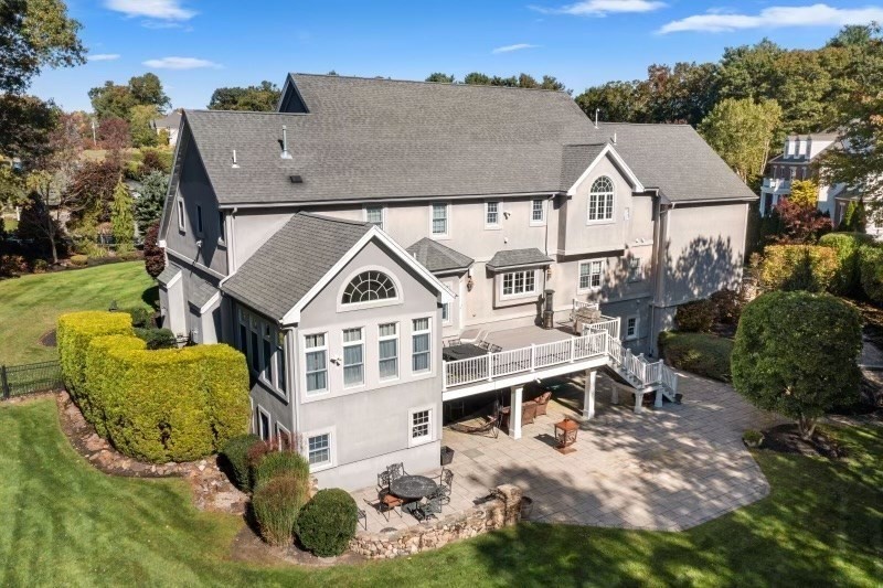 85 Colts Crossing Canton, MA 02021 - Photo 20 of 38 an aerial view of a house with swimming pool and sitting area