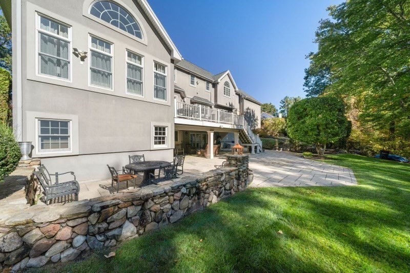 85 Colts Crossing Canton, MA 02021 - Photo 21 of 38 a front view of a house with a yard