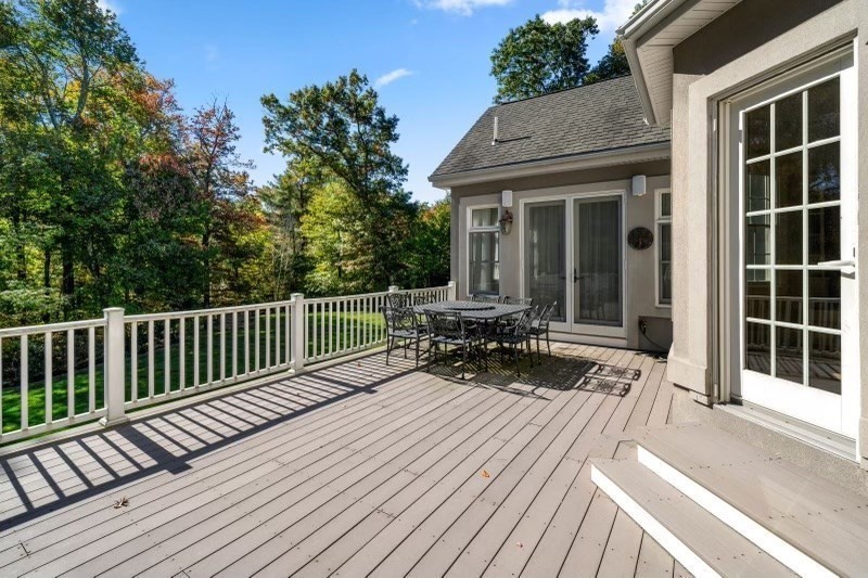 85 Colts Crossing Canton, MA 02021 - Photo 24 of 38 a view of a house with sitting area and wooden floor