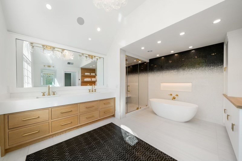 85 Colts Crossing Canton, MA 02021 - Photo 28 of 38 a spacious bathroom with a double vanity sink mirror and bathtub