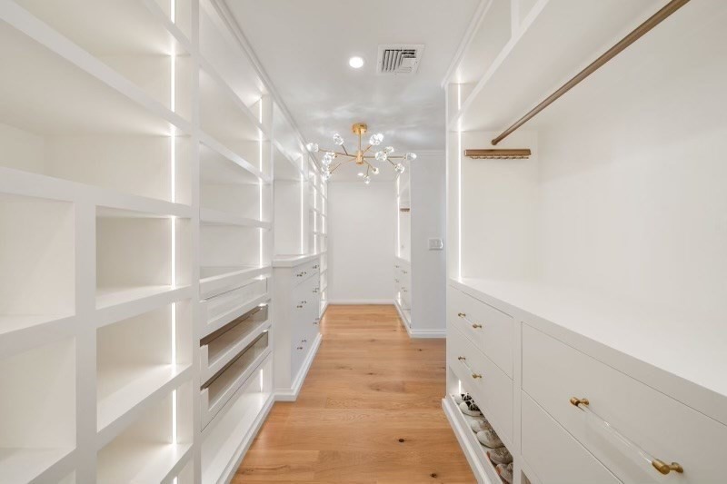 85 Colts Crossing Canton, MA 02021 - Photo 29 of 38 a view of a hallway with wooden floor and staircase