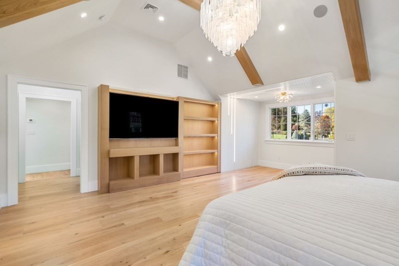 85 Colts Crossing Canton, MA 02021 - Photo 30 of 38 a bedroom with a bed and a flat screen tv