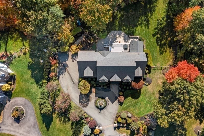 85 Colts Crossing Canton, MA 02021 - Photo 38 of 38 an aerial view of a house with backyard and garden