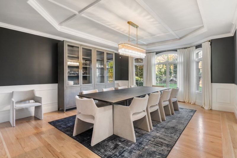 85 Colts Crossing Canton, MA 02021 - Photo 8 of 38 a view of a dining room with furniture wooden floor and chandelier