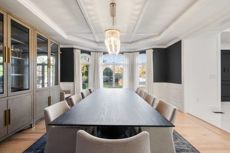 85 Colts Crossing Canton, MA 02021 - Photo 9 of 38 a view of a dining room with furniture window and wooden floor