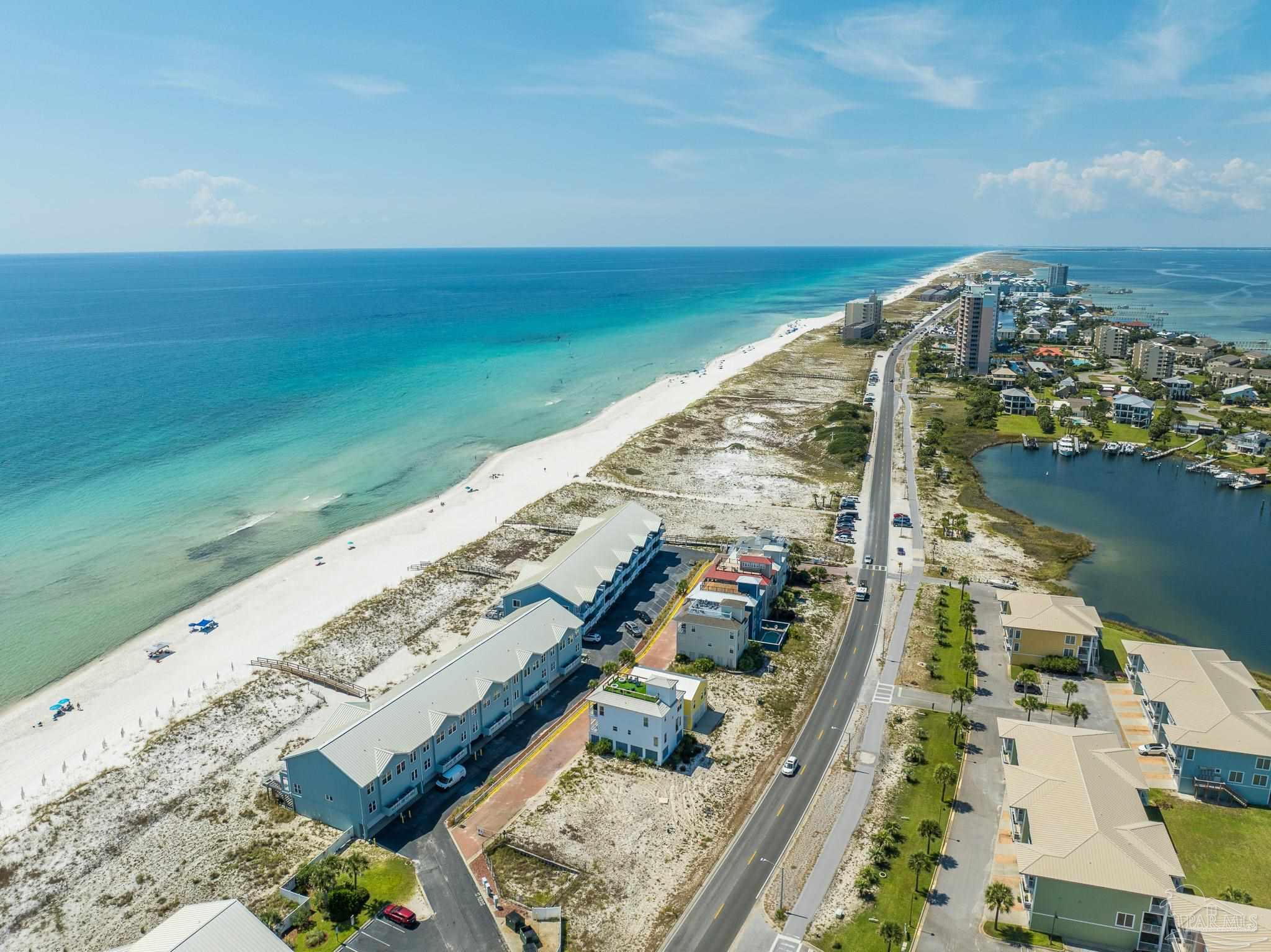521 Fort Pickens Road Pensacola Beach, FL 32561 - Photo 14 of 20 a view of lake and ocean