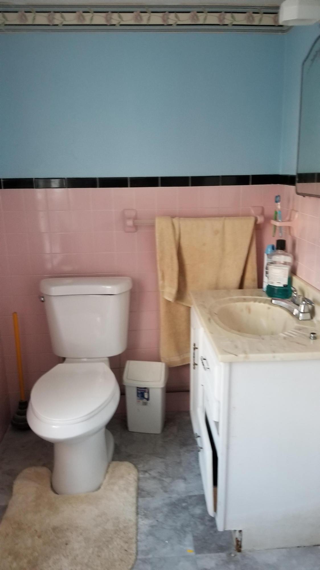 55 Pine Point Road Wellfleet, MA 02667 - Photo 16 of 21 a bathroom with a toilet sink and mirror