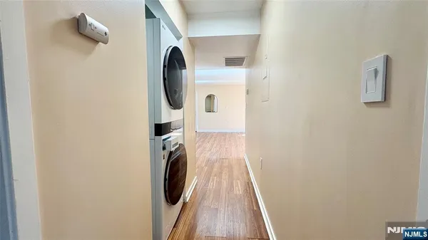 a view of a room with washer and dryer