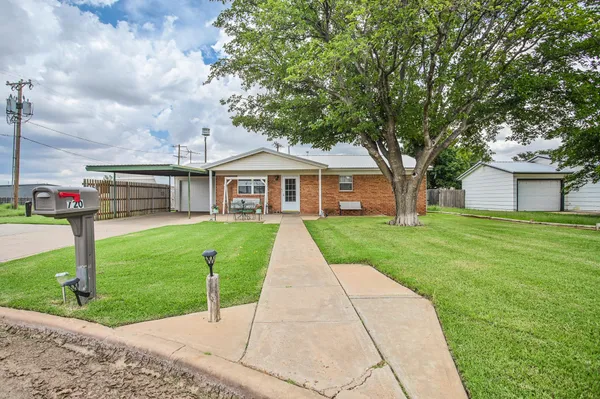 a front view of house with yard