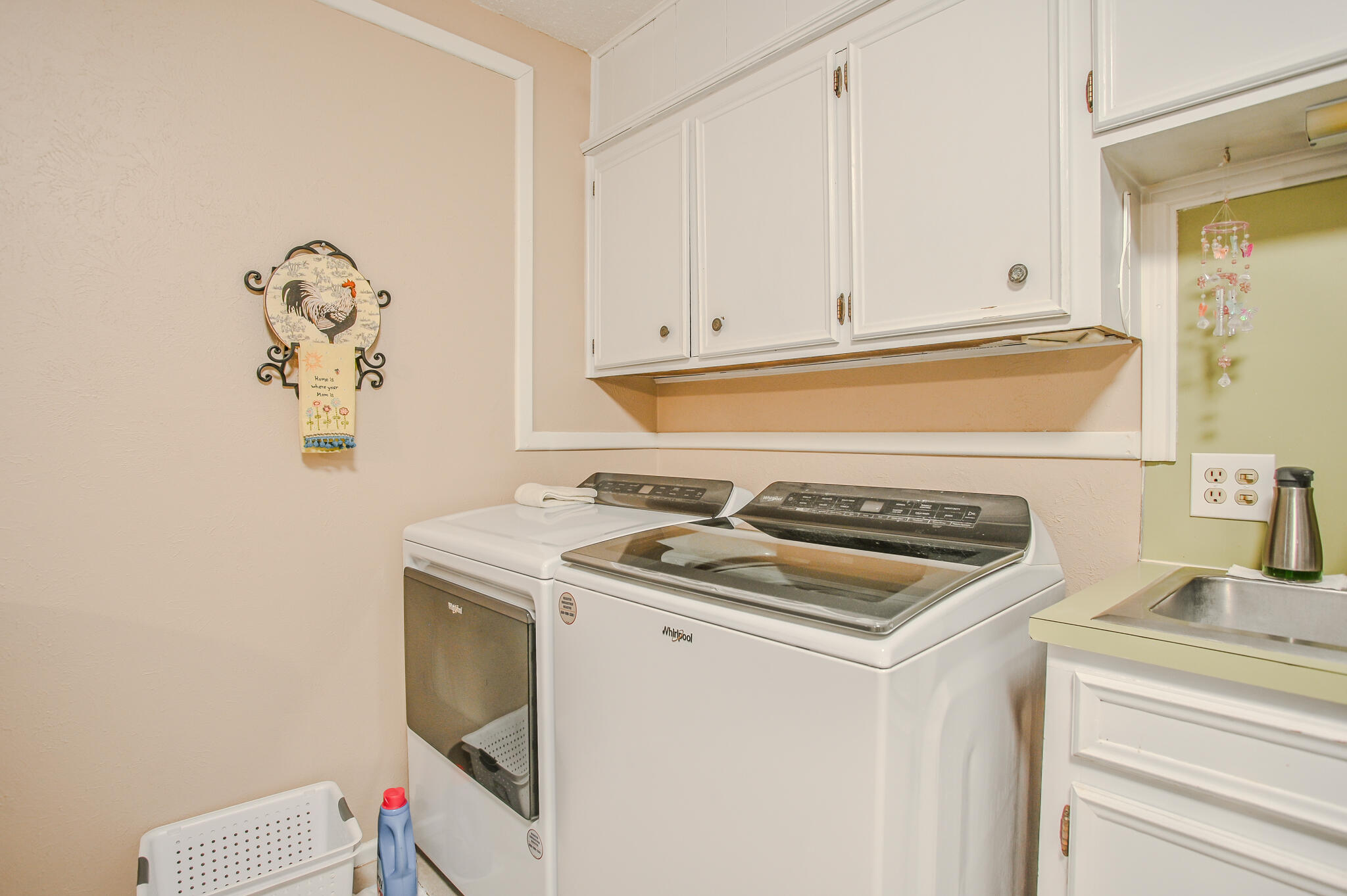 720 South 23rd Street Slaton, TX 79364 - Photo 29 of 46 a kitchen with a stove and a sink